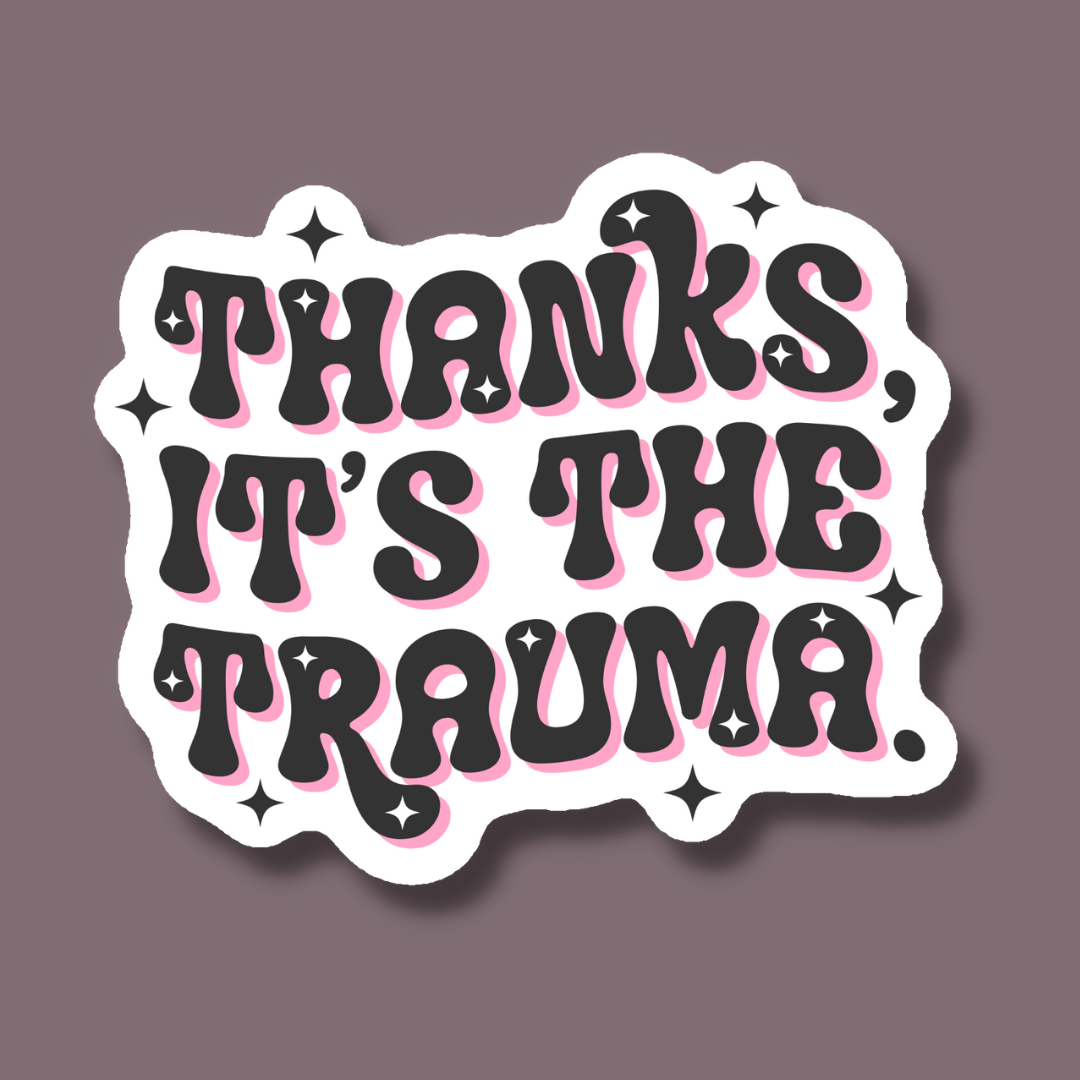 Sticker with text 'THANKS, IT'S THE TRAUMA' on a dark background