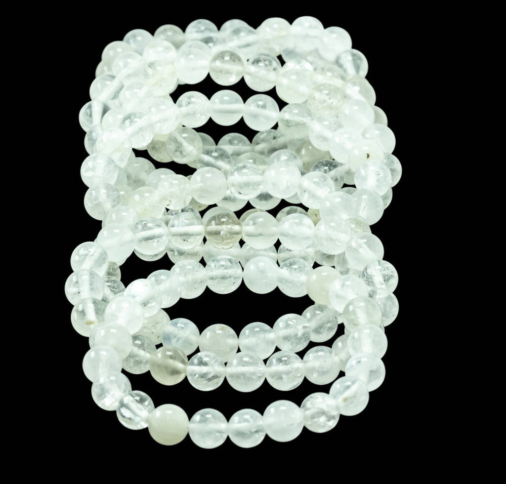 Close-up of Clear Quartz beads showing natural inclusions and clarity