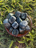 Natural Kambaba Jasper tumbled stones with dark green swirling patterns