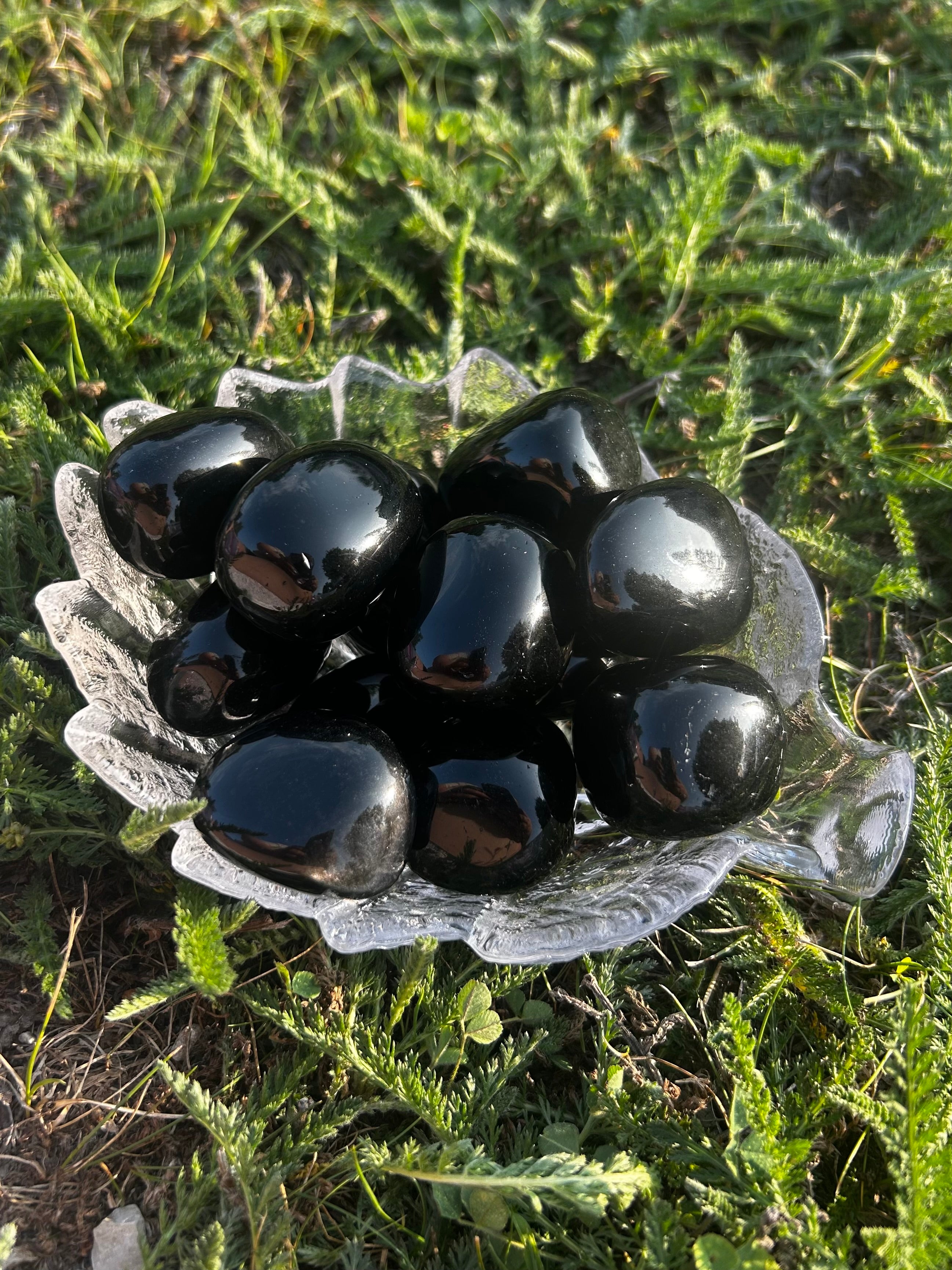 Black Obsidian tumbled stone with smooth polished black surface