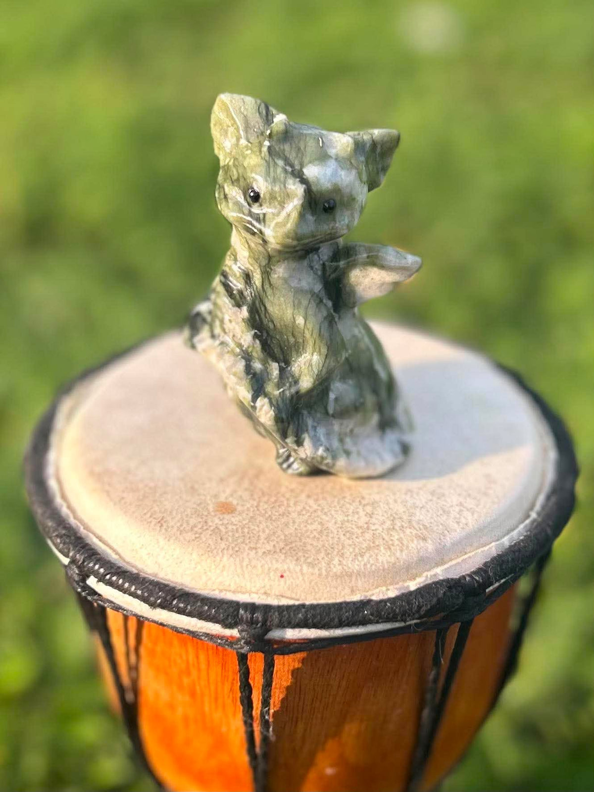 The Guardian nephrite jade dragon carving in an upright seated pose
