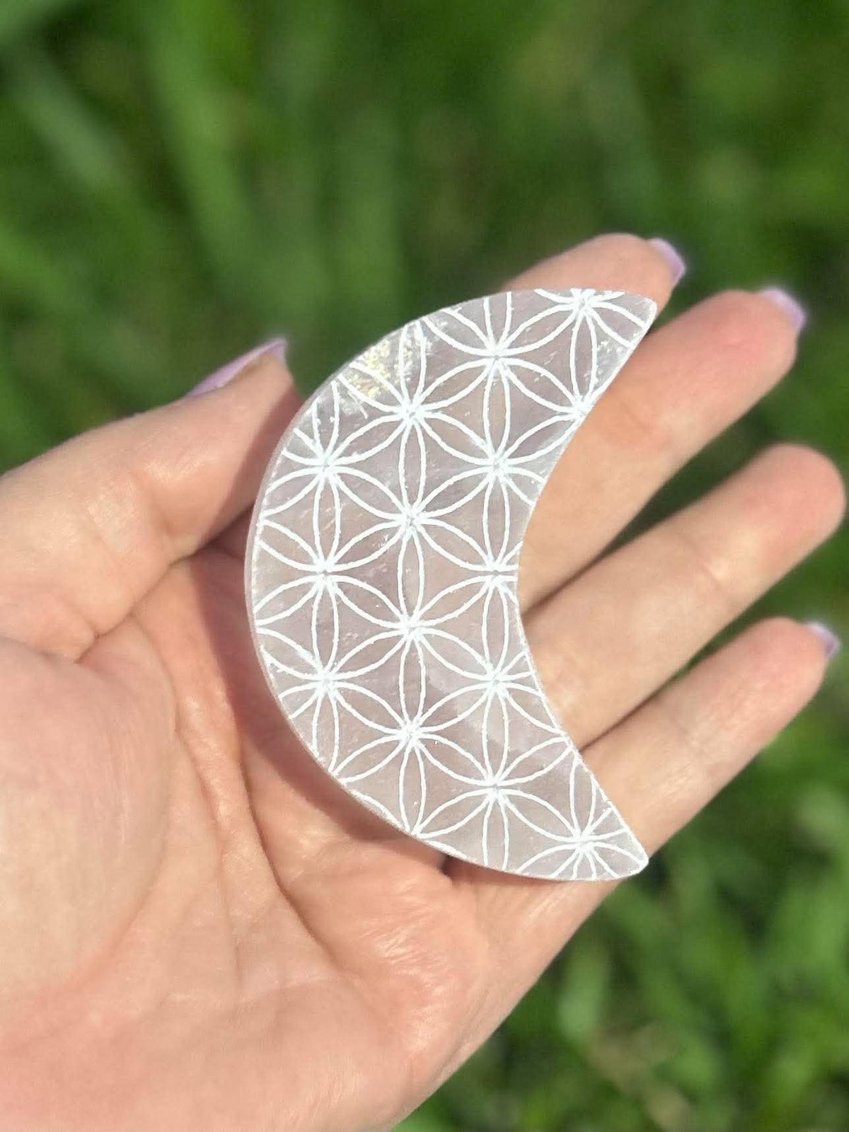 Selenite crescent moon crystal with white sacred geometry Flower of Life engraving