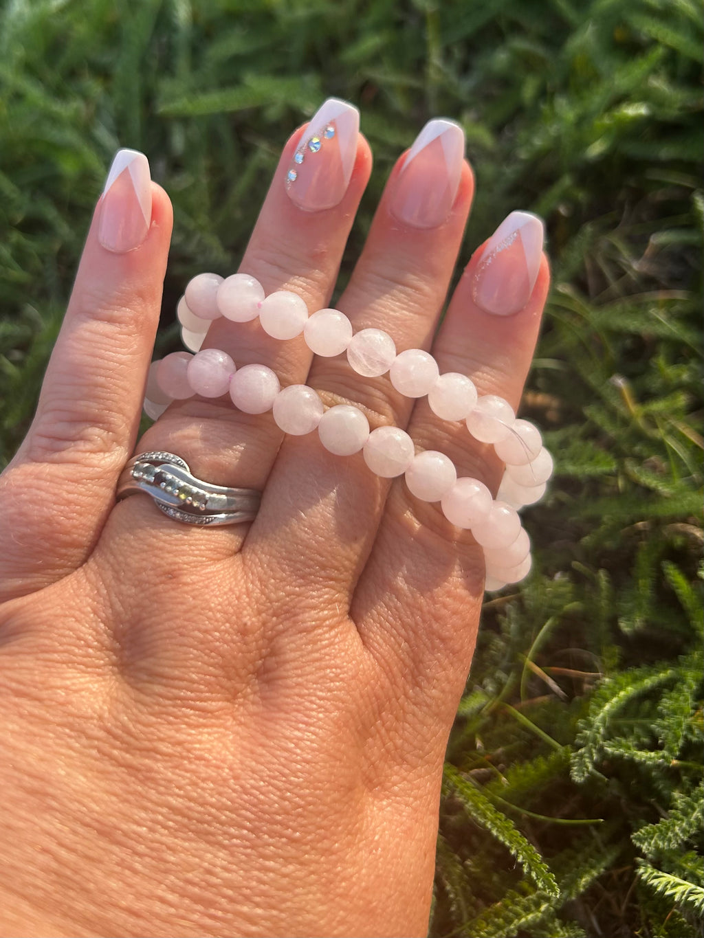 Natural Rose Quartz gemstone bracelet with soft pink coloring