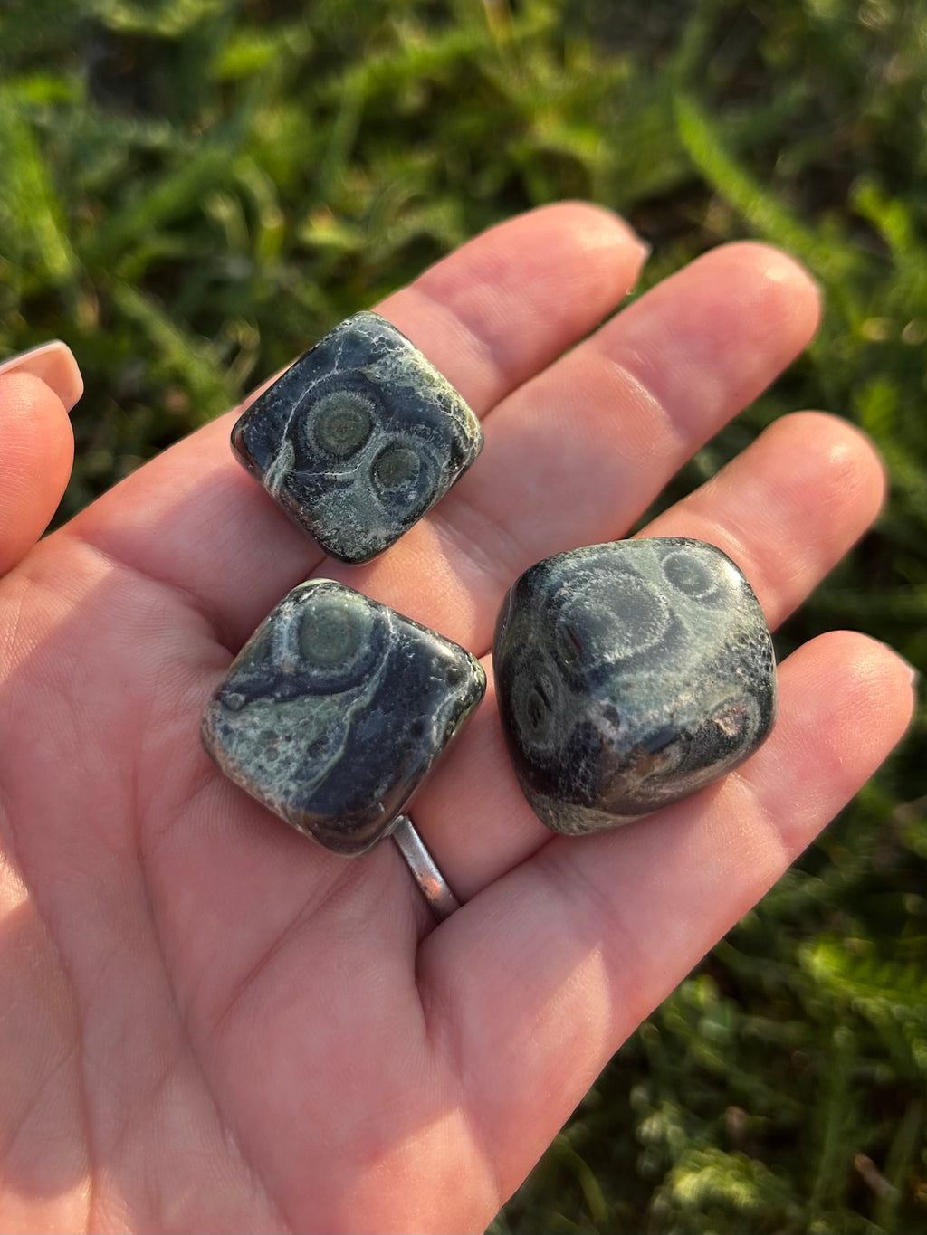 Kambaba Jasper tumbled stone showing unique natural green and black markings