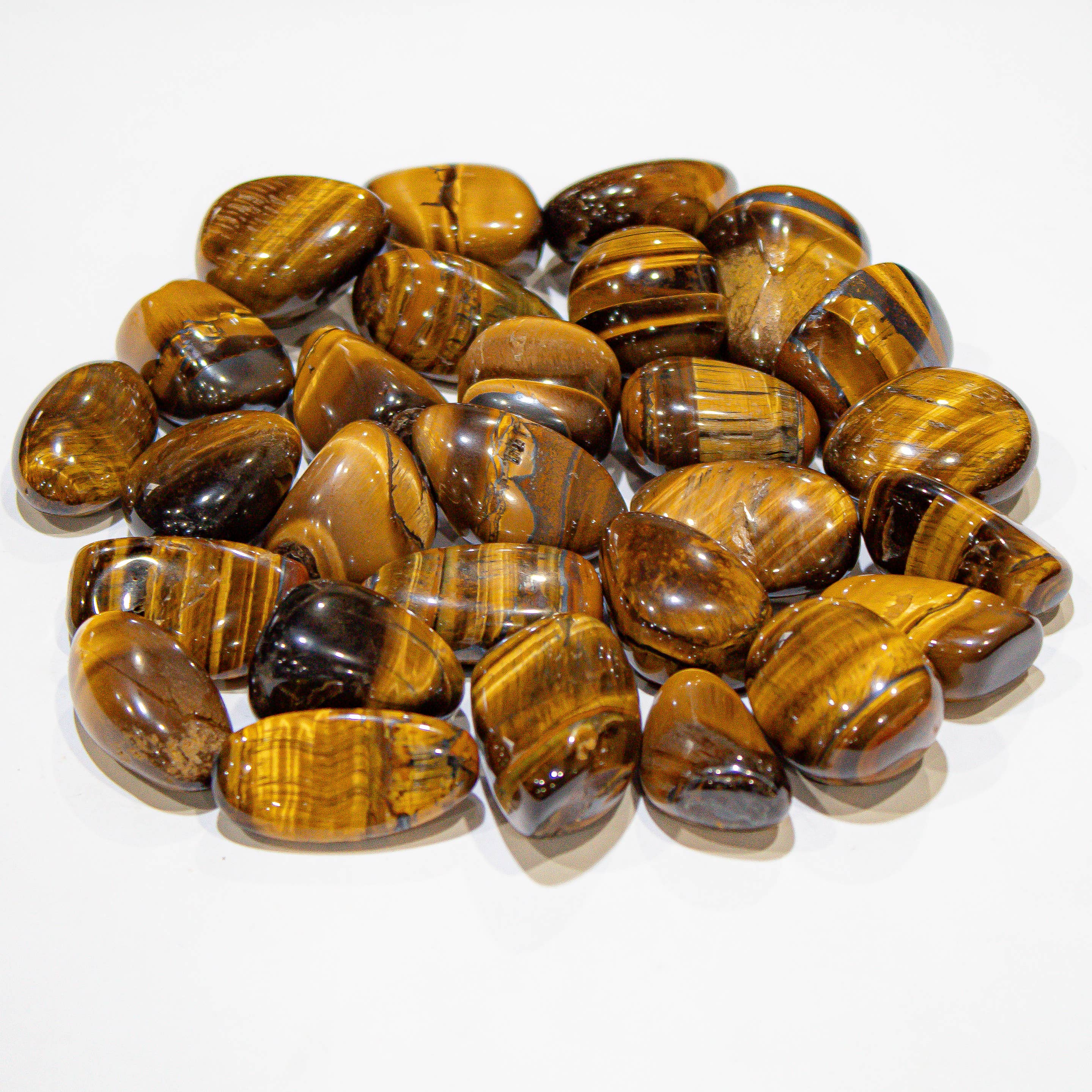 Natural Yellow Tiger Eye tumbled stones with distinctive chatoyancy