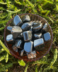 Hematite tumbled stone with polished metallic gray finish