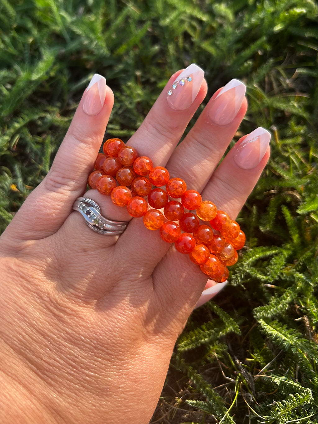 Natural Fire Agate gemstone bracelet with fiery red, amber, and gold tones