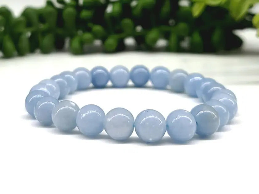 Close-up of polished Angelite beads showing natural color and texture variations