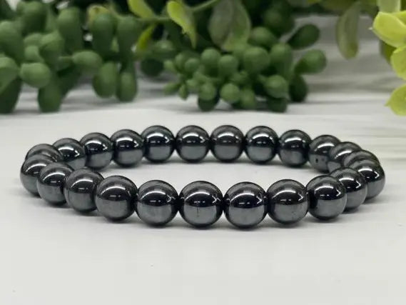 Natural Hematite gemstone bracelet with polished dark gray and black beads