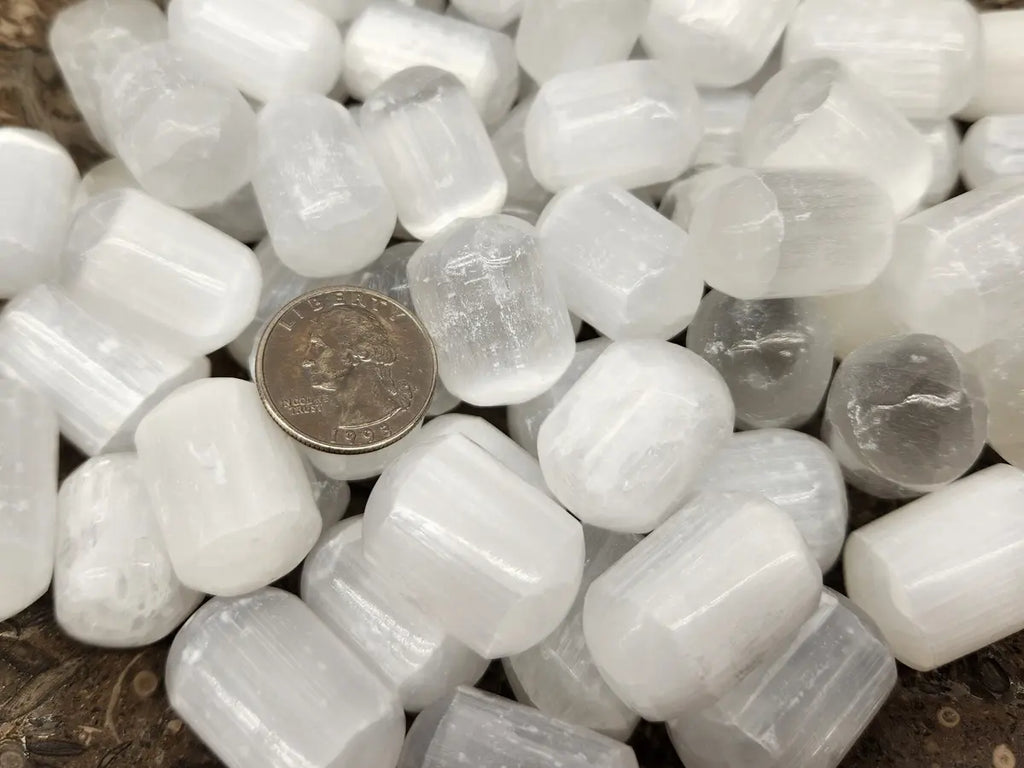 Close-up of polished Selenite stone showing silky fibrous texture