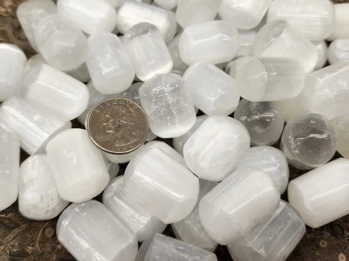 Close-up of polished Selenite stone showing silky fibrous texture