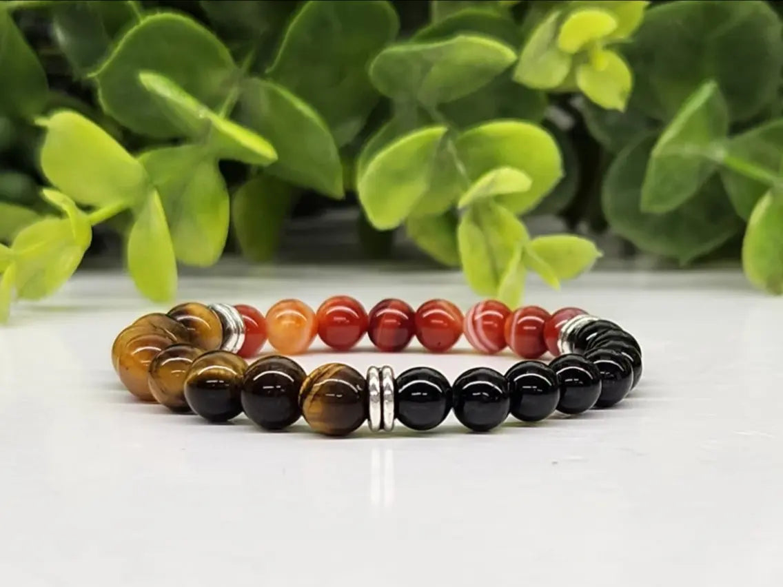 Children’s intention bracelet featuring Banded Carnelian, Yellow Tiger Eye and Black Tourmaline