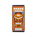 Chocolate bar packaging with a colorful design featuring a campfire and bear, on a white background.